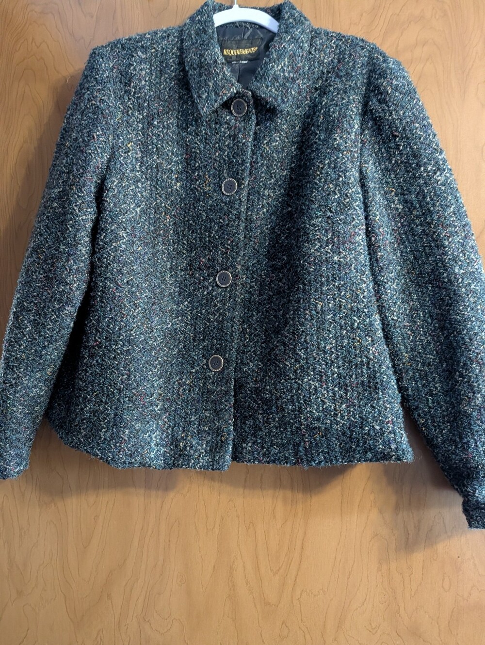 REQUIREMENTS Ladies Twead Blazer.  Size 18.  Long Sleeves.  Blue Colored.